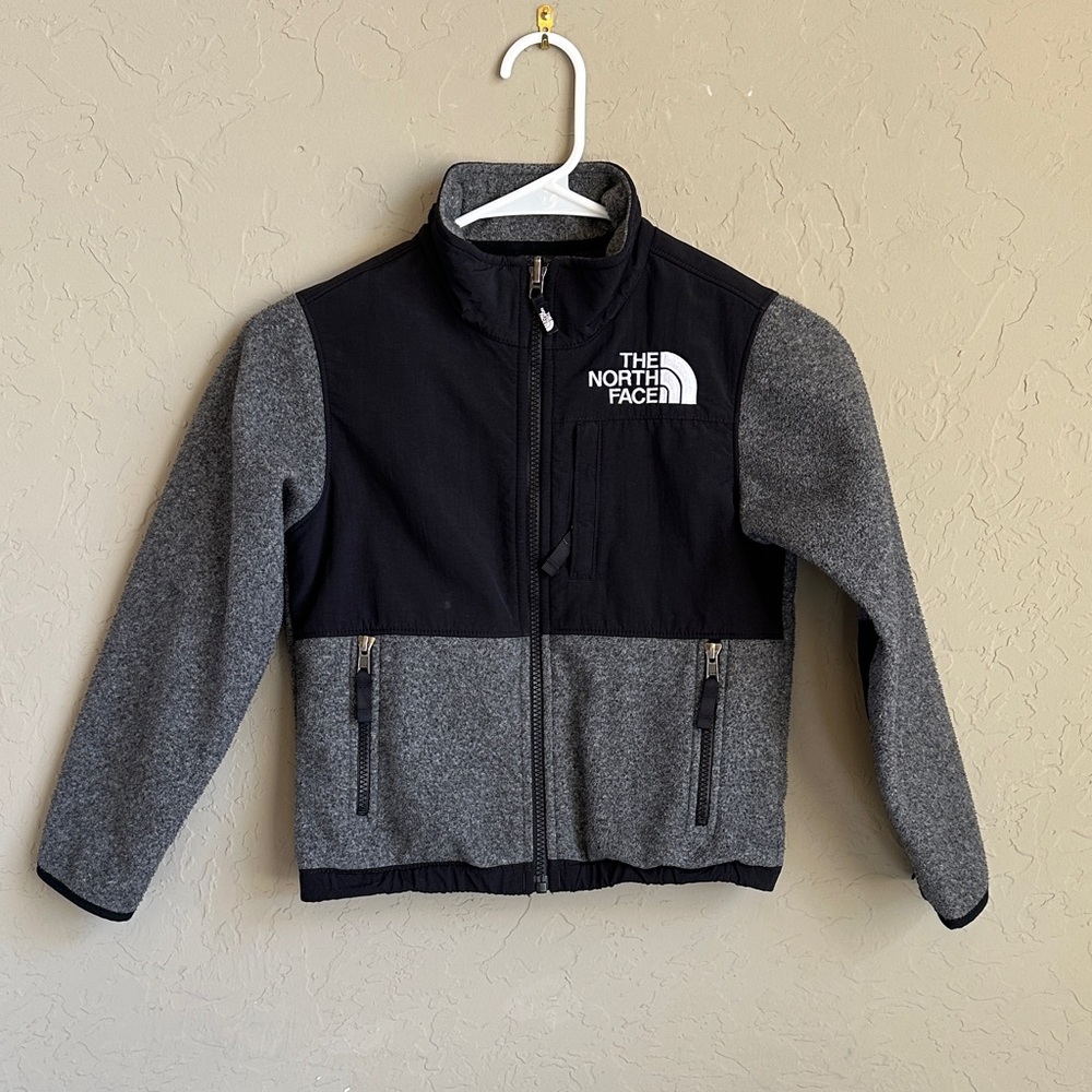 Size extra small the Northface zip front gray, and black kids sweater‎